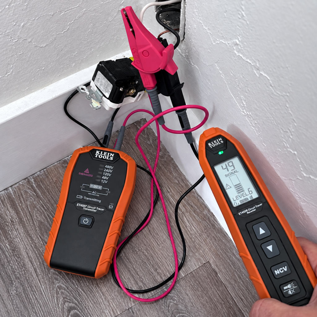 Electrical circuit tracer tools testing an outlet during Bay Area troubleshooting