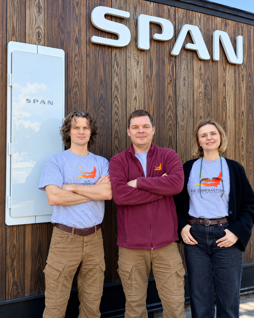 ELC Contractor team standing in front of a SPAN smart electrical panel display in San Jose